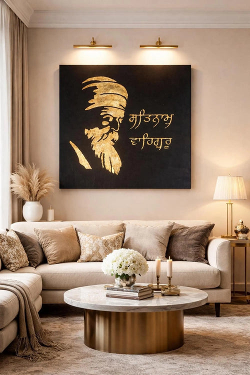 Guru Nanak Dev Ji gold foil canvas wall art with Satnam Waheguru lettering framed in a luxury living room