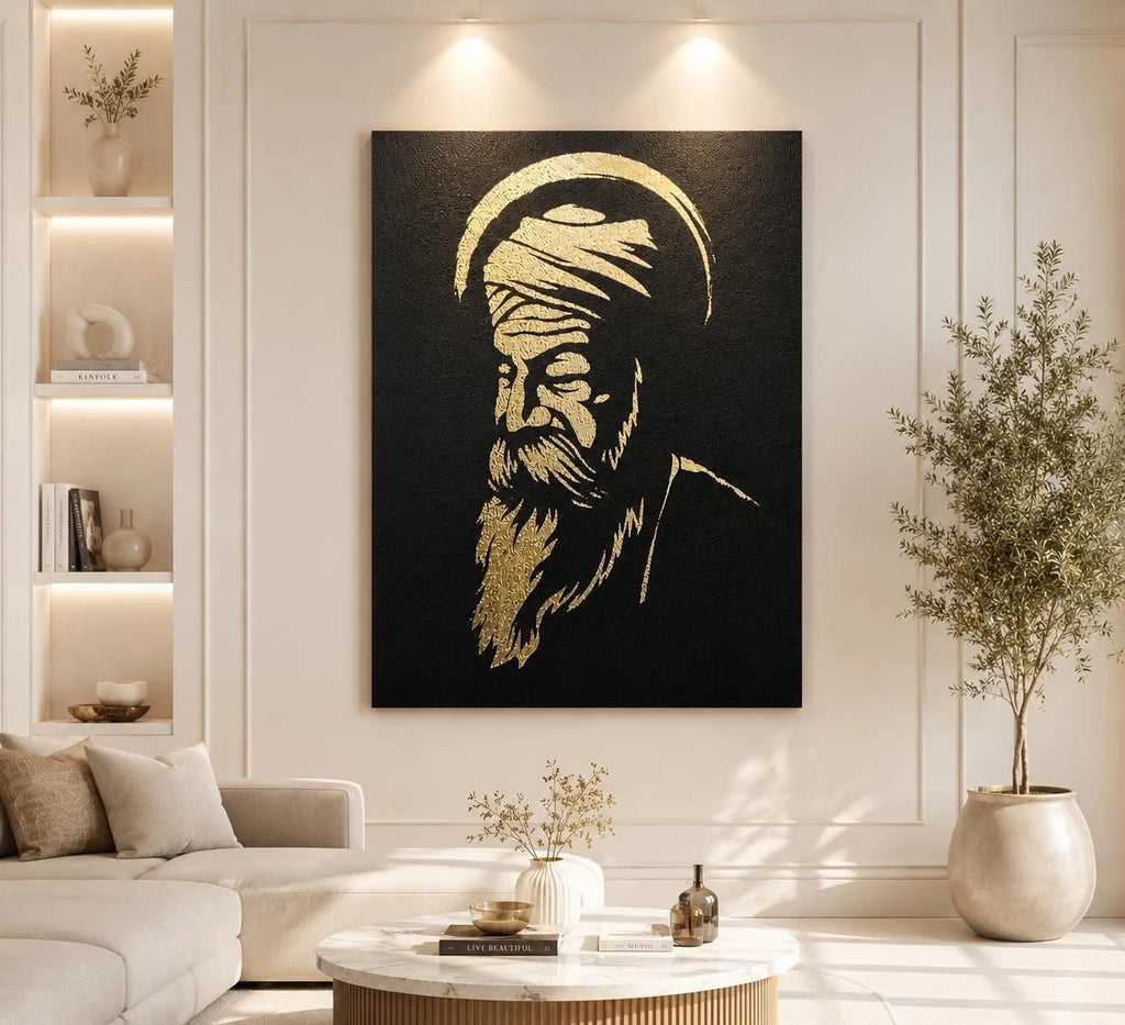 White framed Guru Nanak Dev Ji gold foil canvas wall art hanging in a bright modern living space